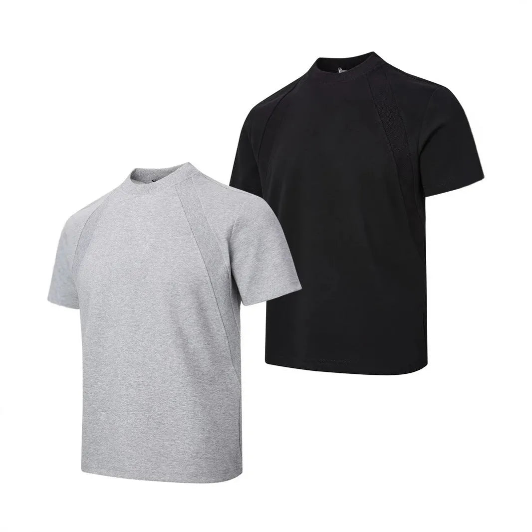 Men's black loose-fit short sleeve top with textured air layer stitching detail.