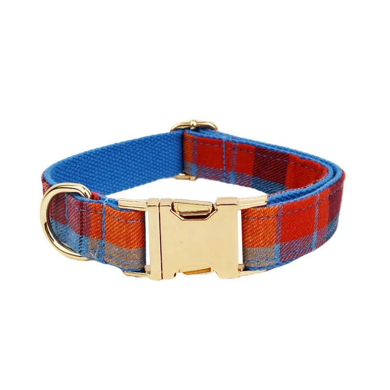 Blue velvet plaid dog collar set with cloth lead and hand holding rope on pet bandana