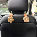 Plastic car seat hook in white Xuan Ya flower colour, 11x5.5cm, for hanging storage on seat back