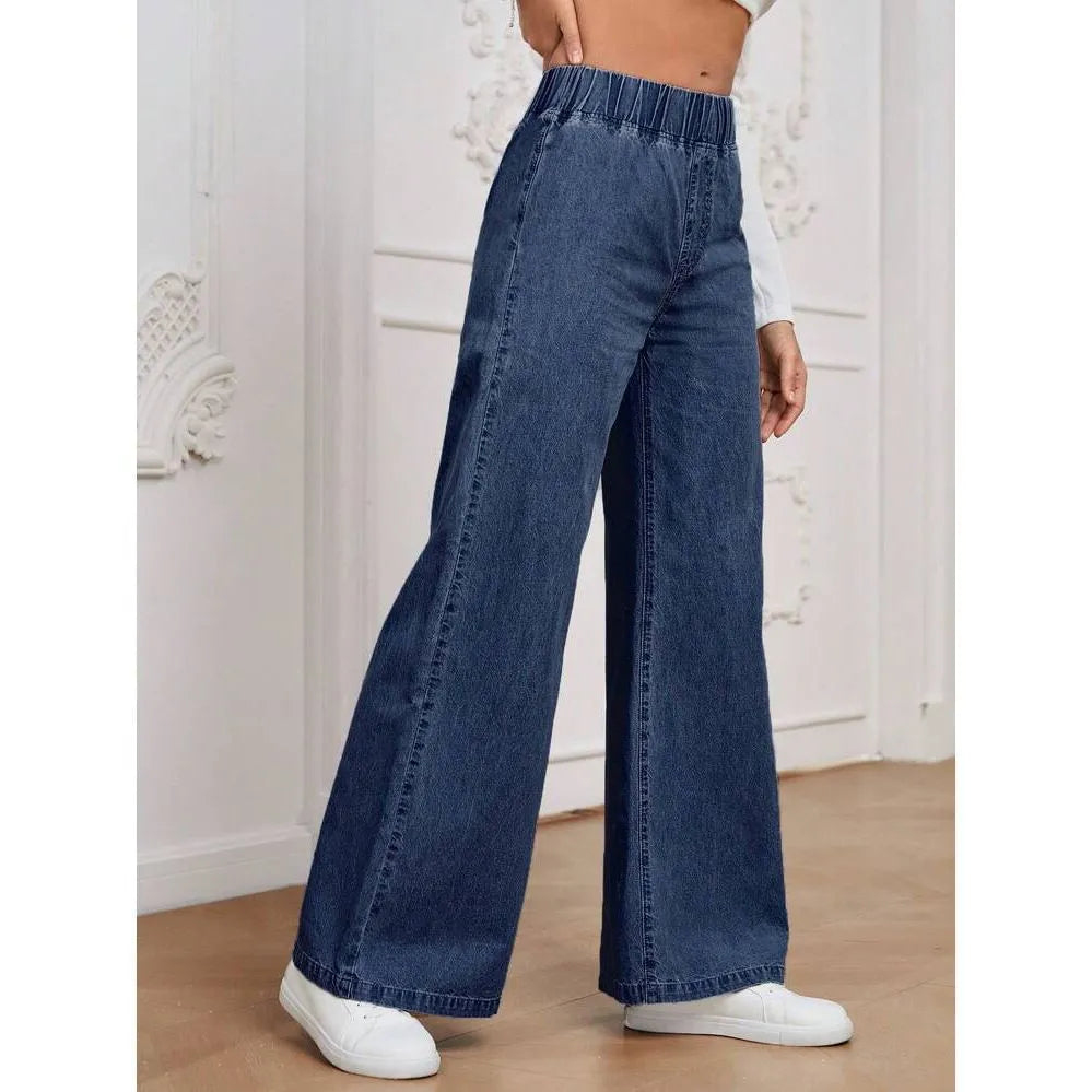 Light blue washed wide-leg denim jeans with straight cut and mid-rise waist on hanger