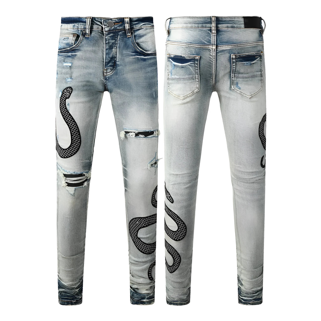 Blue distressed wash skinny jeans with a button fly and elasticated mid-rise waistband on a mannequin.