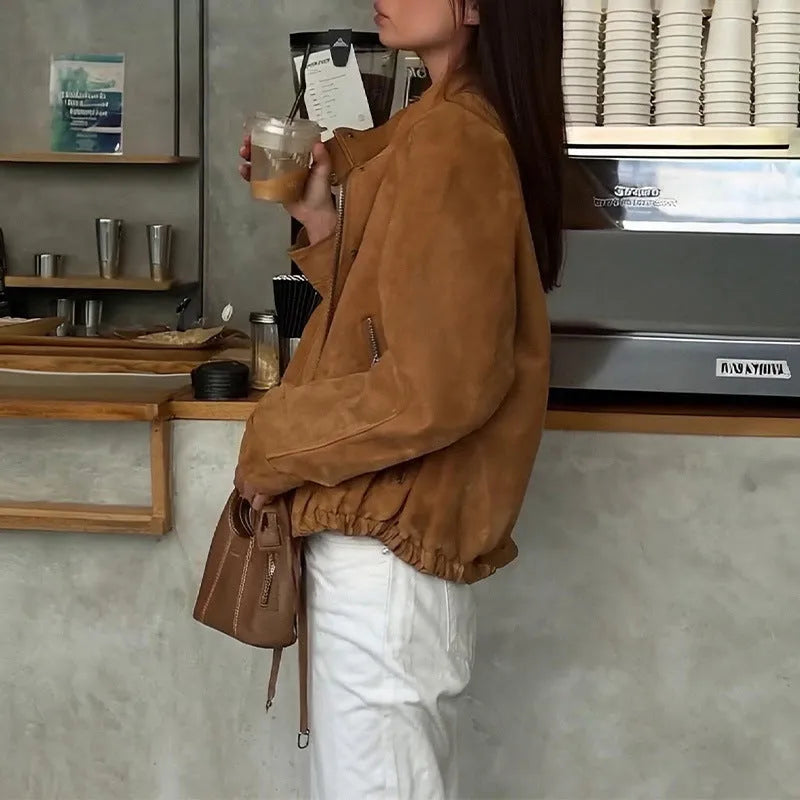 Solid colour loose-fit retro jacket with long sleeves on a model