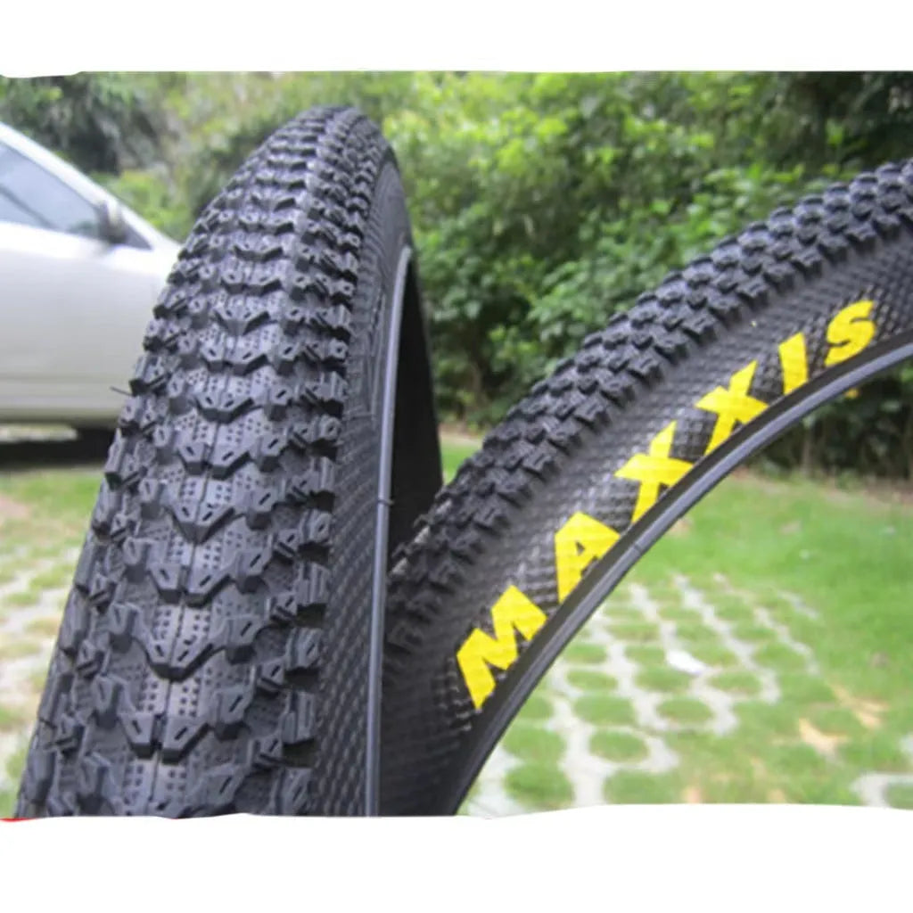 Mountain bike ultralight puncture proof tyre shown in black with white label sidewall option.