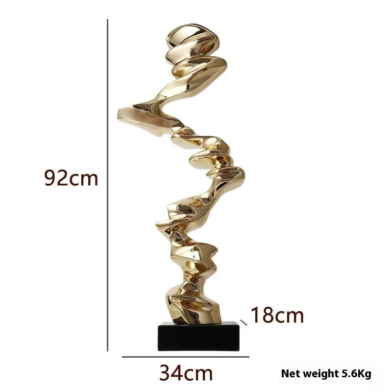 Modern abstract still life sculpture ornament in bright gold, elegant silver, or phantom blue.