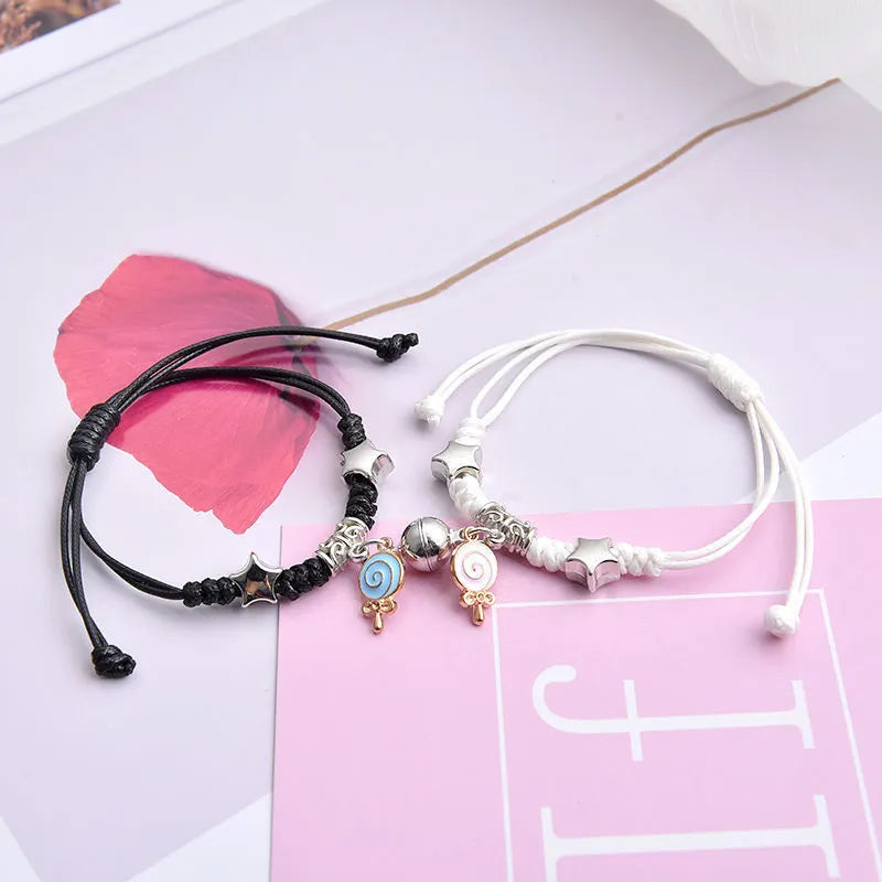 Magnetic couple bracelets with alloy construction and various design options including love symbols and animal patterns