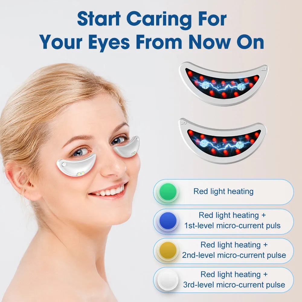 White wireless red light EMS facial and eye massager device on a table