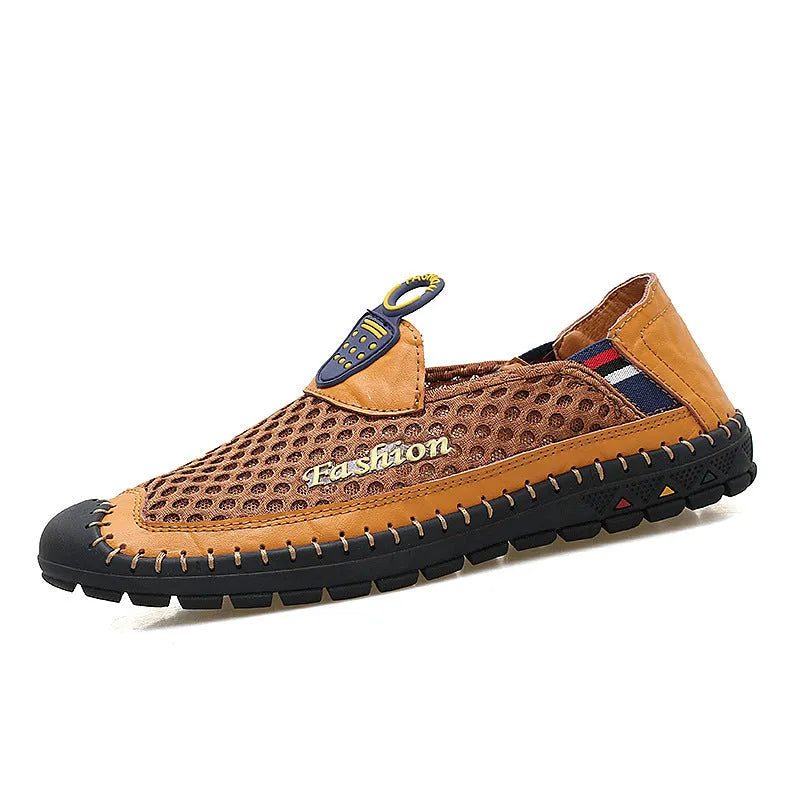 Men's brown breathable mesh casual shoes with round toe and rubber sole on a plain background.