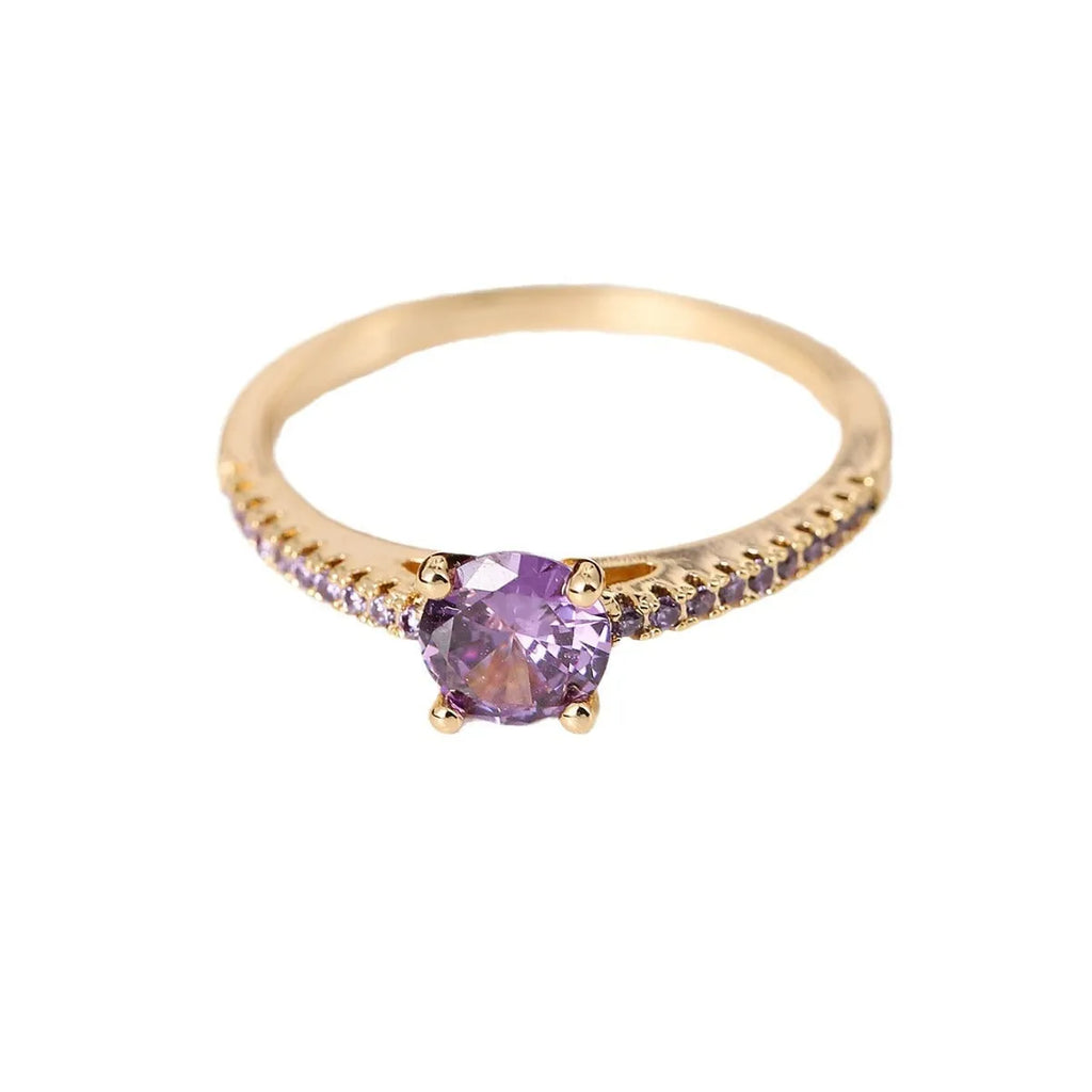 A hexagonal geometric ring made of copper with an electroplated finish, shown in a gold rose red colour.