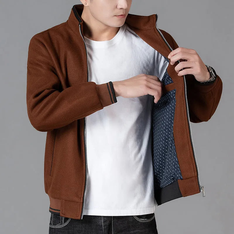Men's grey polyester fleece autumn jacket with zip pockets, shown on a hanger.