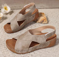 Women's brown platform Roman sandals with Velcro strap closure and open toe design