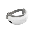 White rechargeable eye massager with hot compress function on a plain background