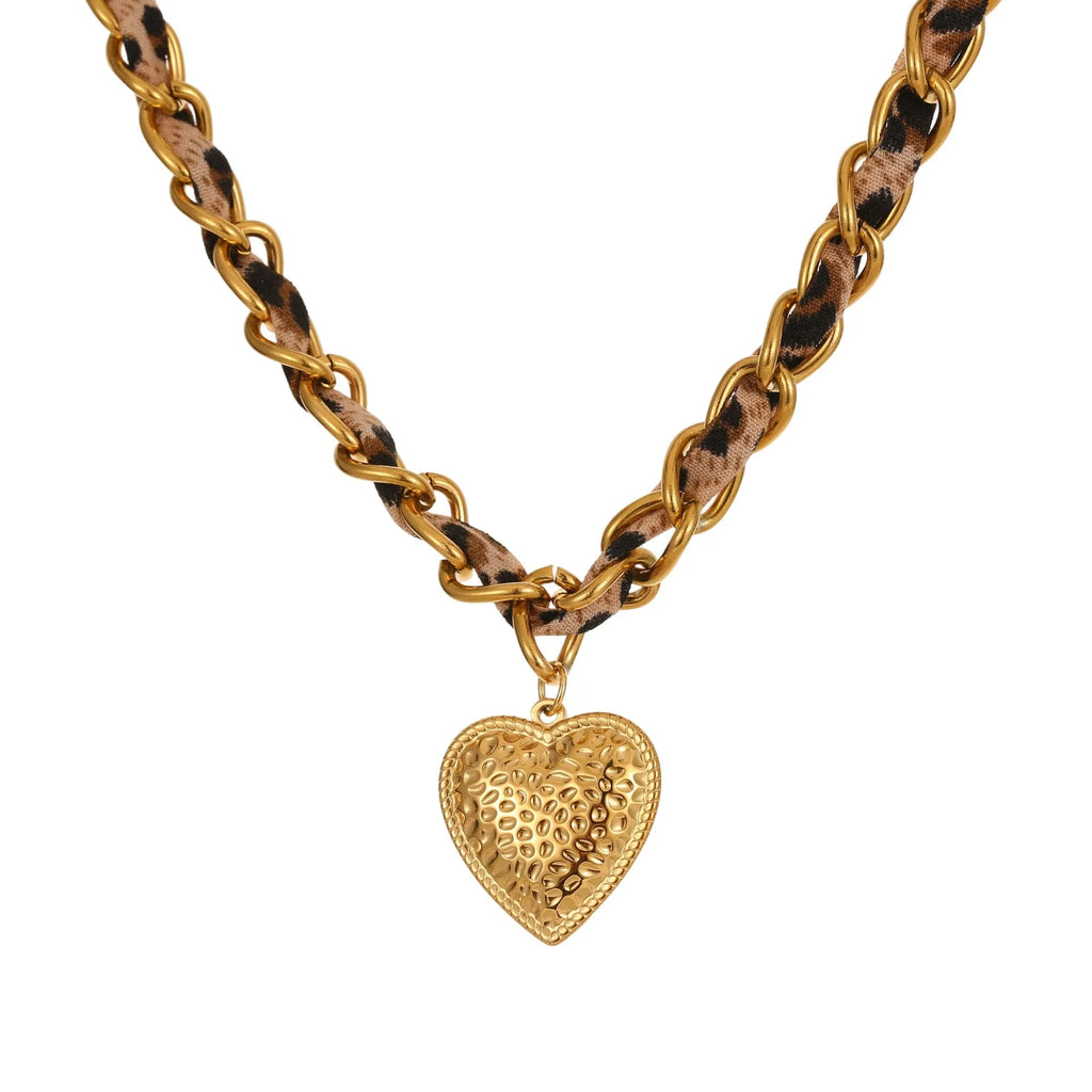 Geometric leopard love pendant on adjustable stainless steel necklace chain with gold-toned finish