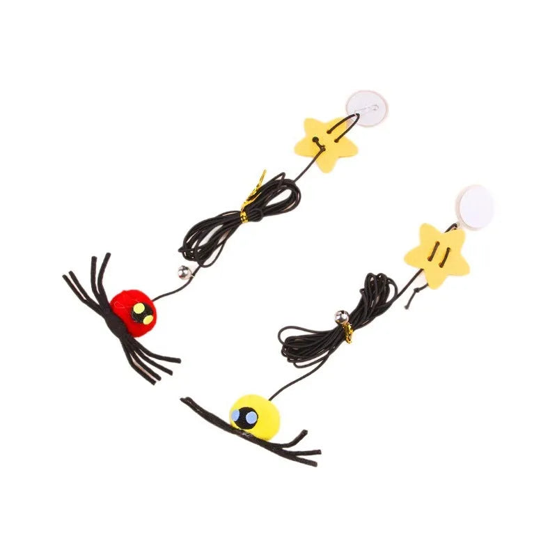 Red cat hanging toy with feather stick and bell spider on elastic rope mounted to door