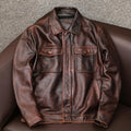 Men's black PU leather lapel jacket shown on a model, featuring side seam pockets and a loose fit.