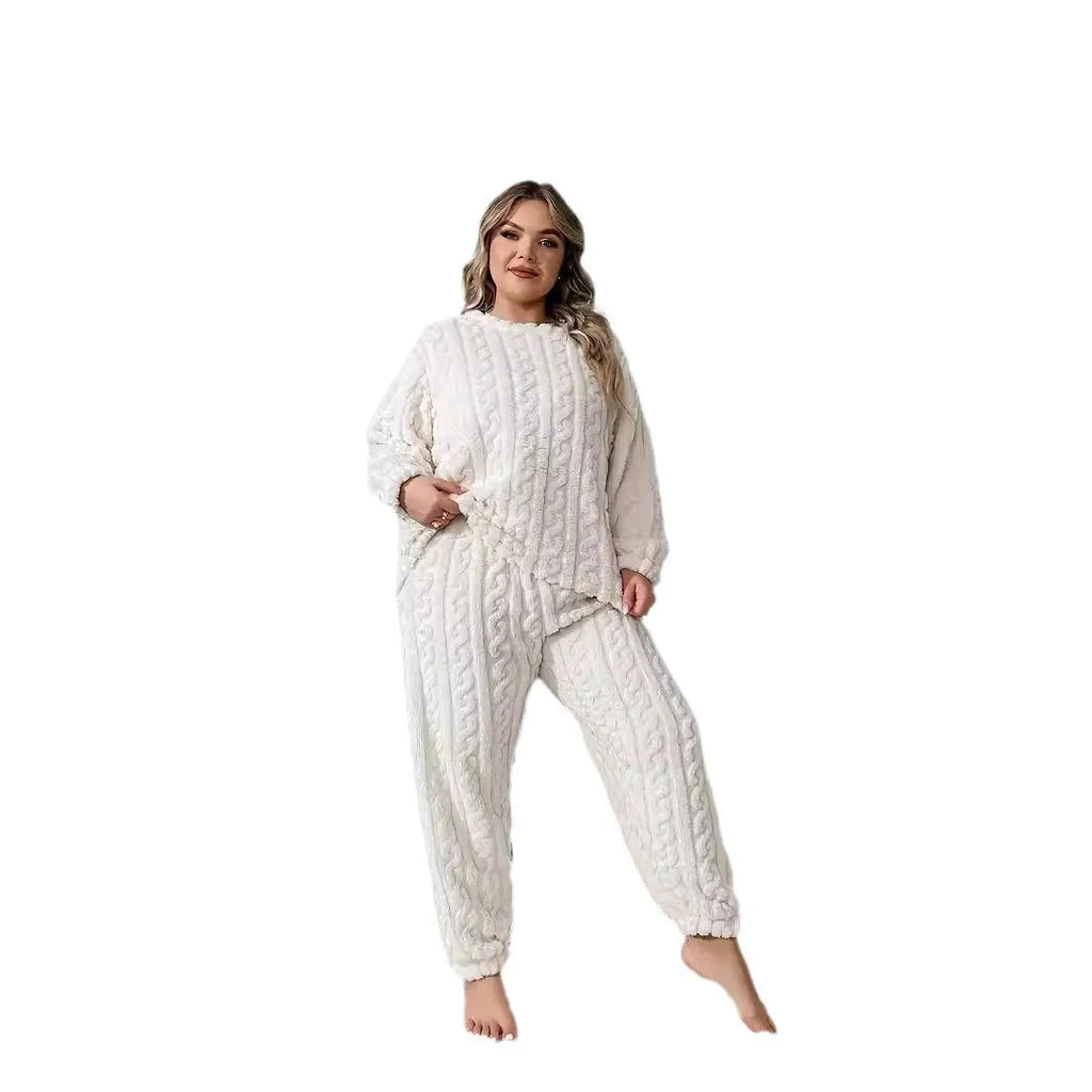 Women's creamy white polyester two-piece suit with crew neck top and matching trousers