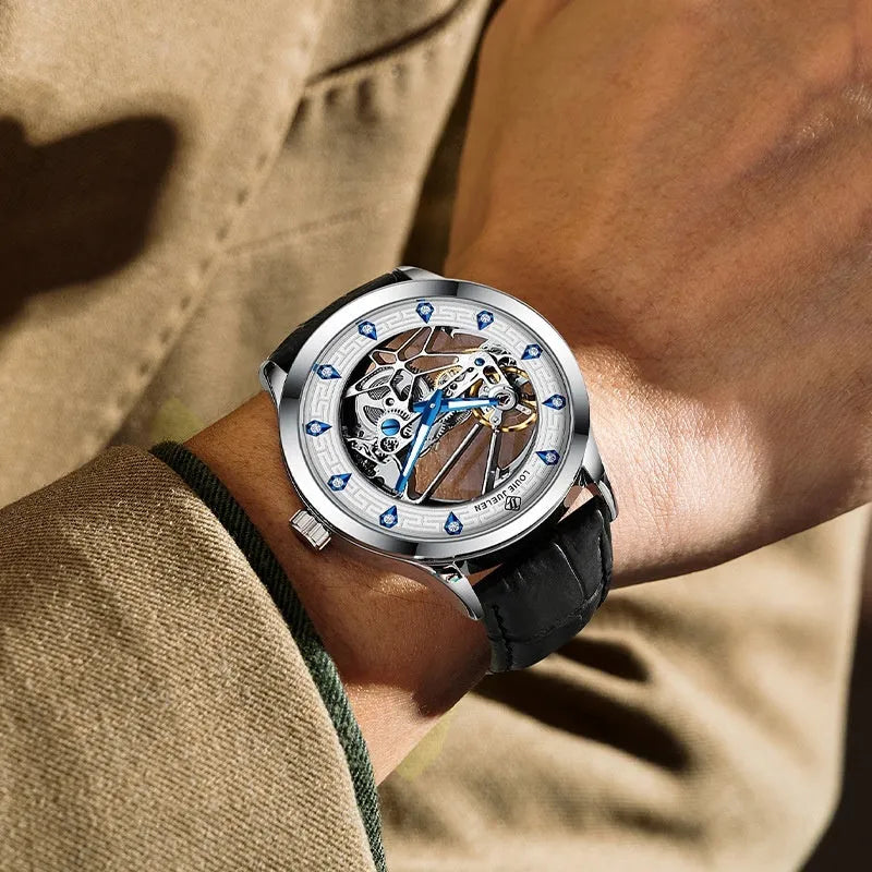 Men's silver case mechanical watch with white dial, blue hands, black leather strap and waterproof construction