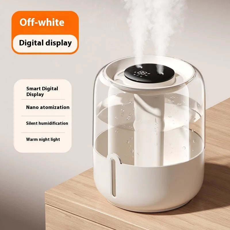 Beige round USB humidifier with dual spray nozzles and a front humidity display panel.