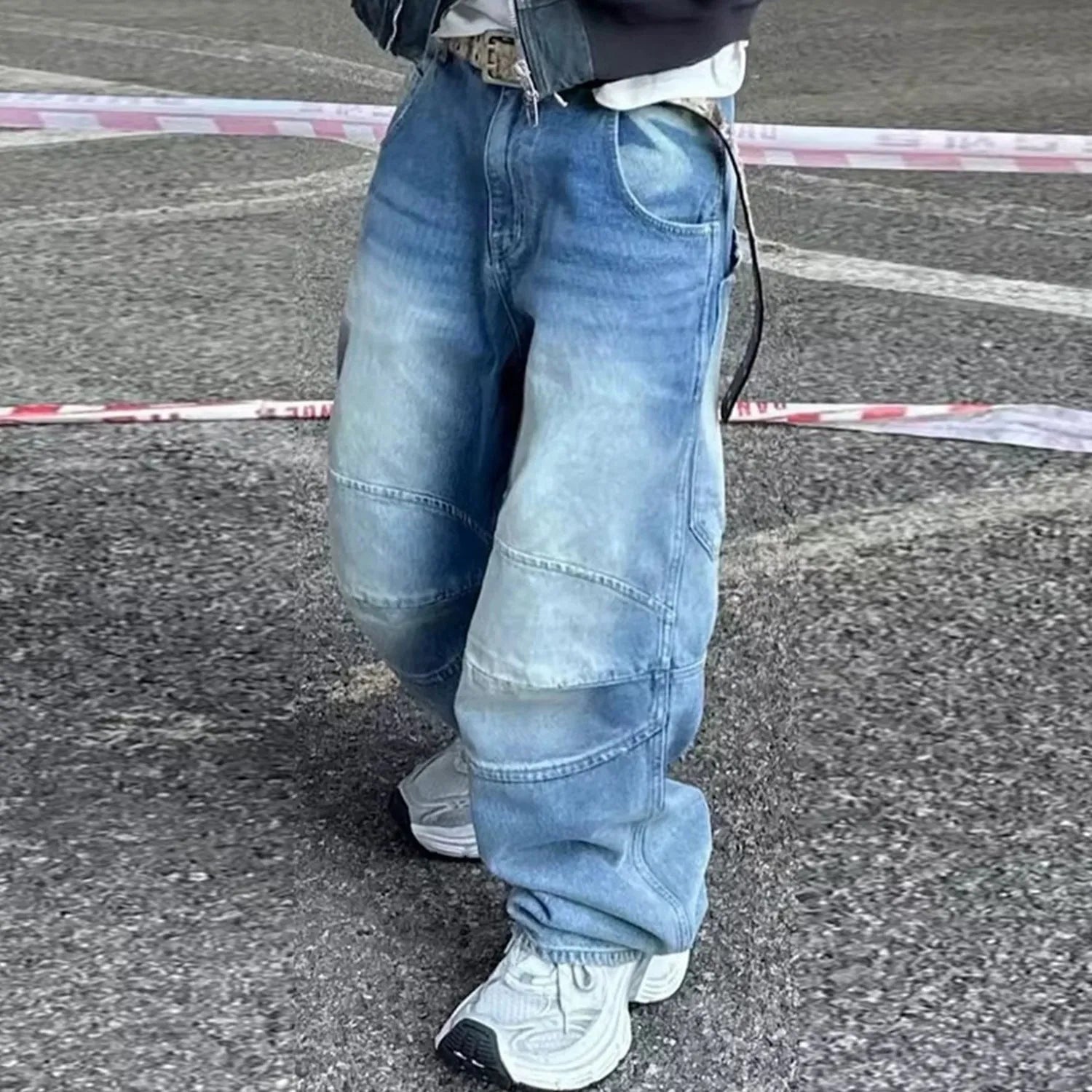 Profile Pleated baggy straight-leg washed white blue jeans on model