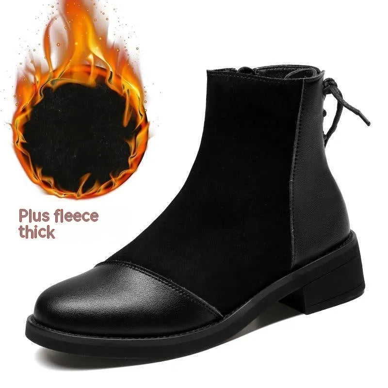 Black women's knee-high Martin boots with side zip, bow detail, and a round toe on a non-slip rubber sole.