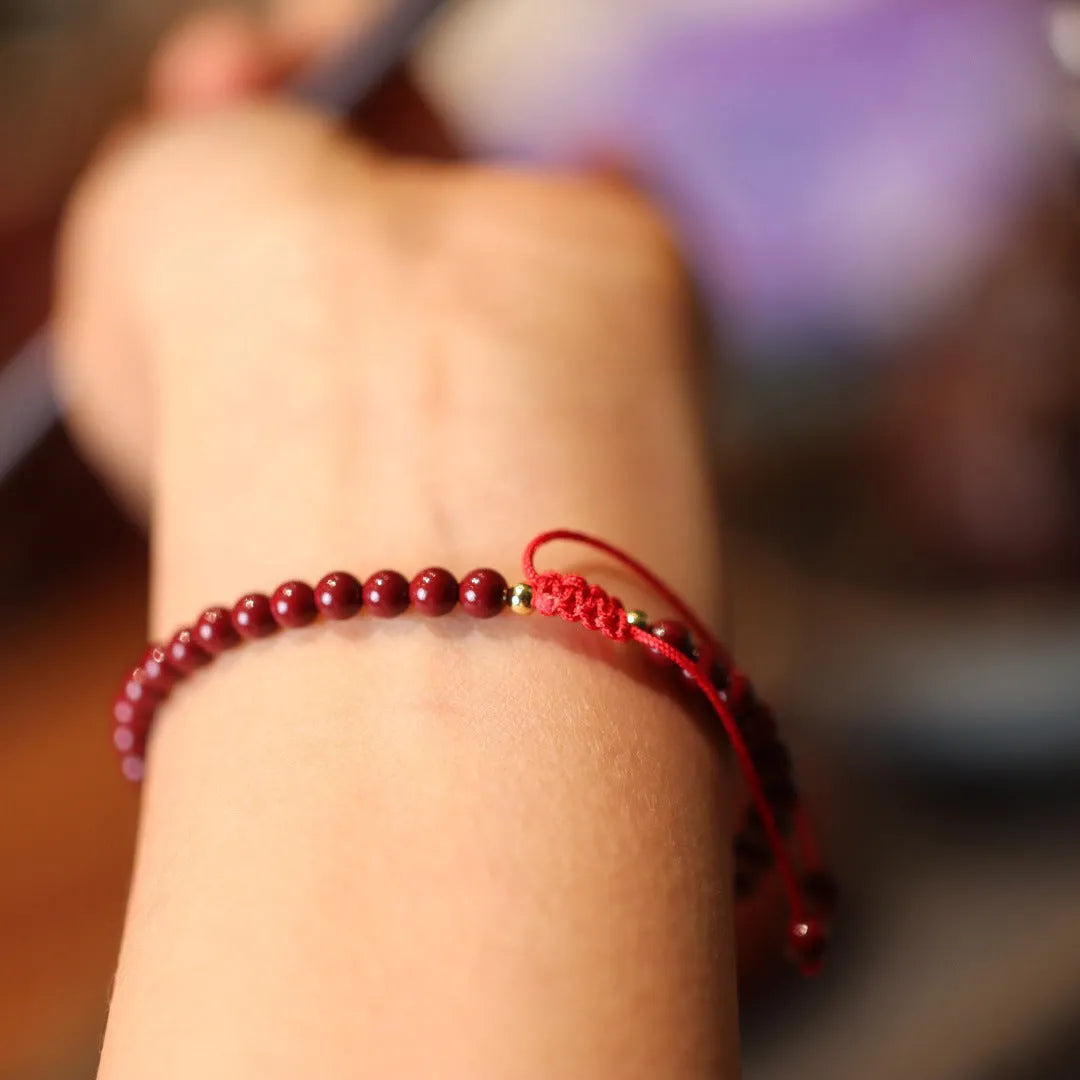 Natural cinnabar bracelet with purple gold sand design and geometric shape featuring Chinese auspicious patterns