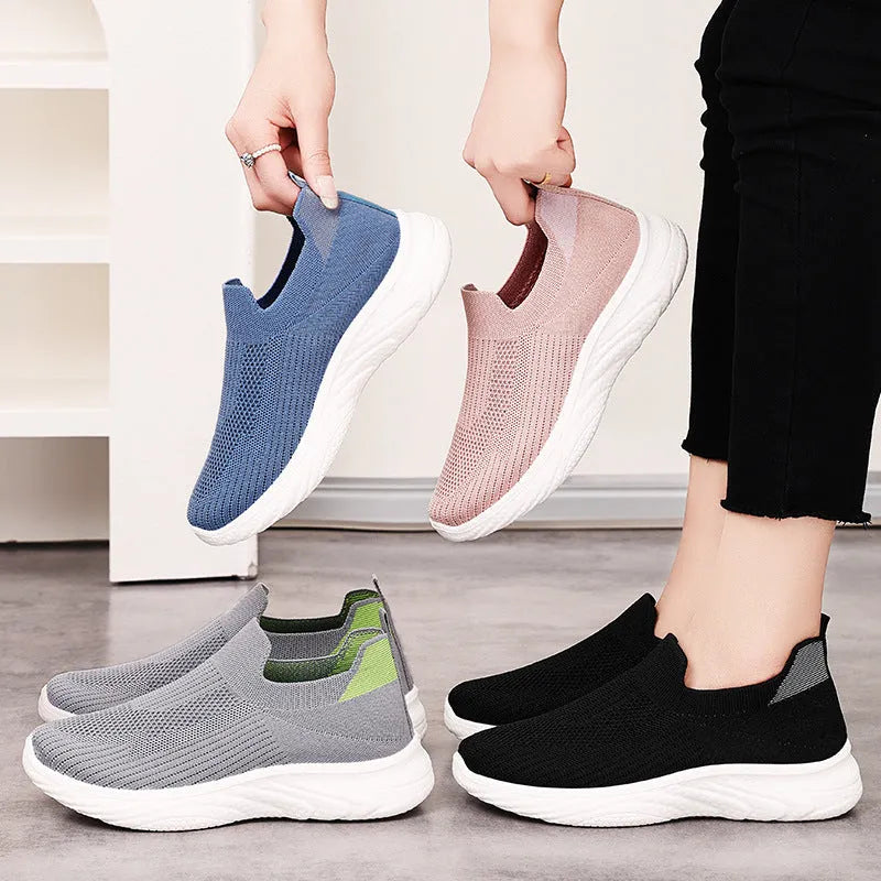 Breathable Flyknit running shoes with soft sole and flat heel, solid colour, low top design