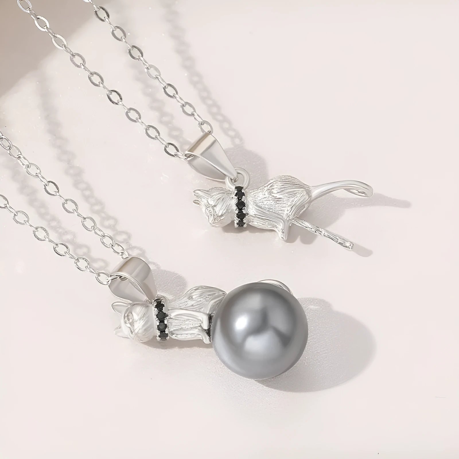 Sterling silver cat pendant necklace with feline design, available with or without chain