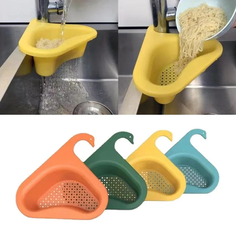 Household sink hanging fruit and vegetable drain basket in green plastic, clipped onto sink rim with slotted base