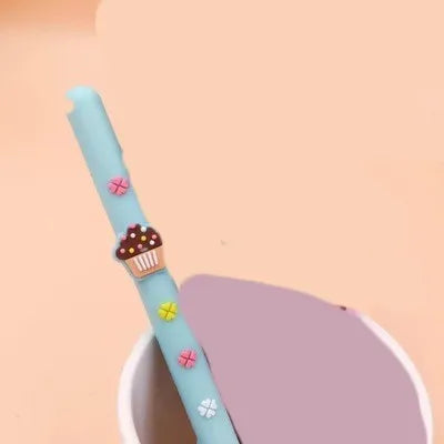 Set of five Korean soft gel chocolate scented needle tube gel pens with black ink, assorted chocolate-themed colours, plastic barrel, cap closure