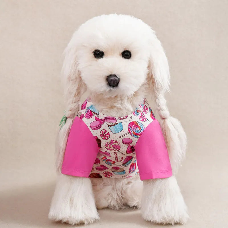 Colourful printed polyester T-shirt for a small dog, showing size chart for S, M, L, XL, and XXL.
