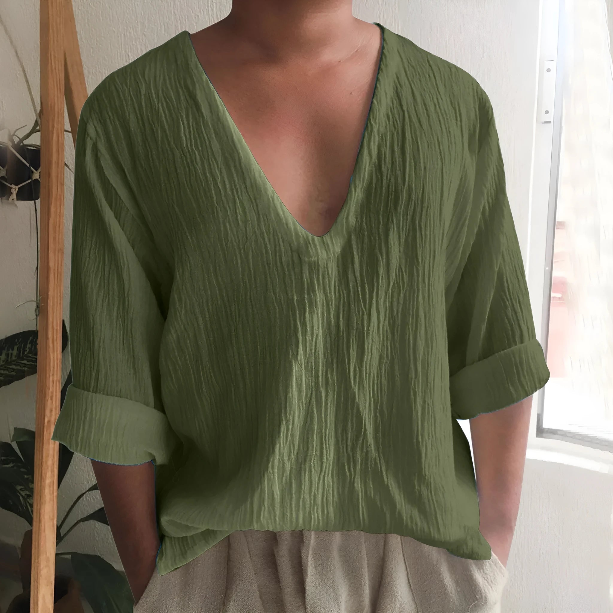 Men's solid colour V-neck long sleeve t-shirt in washed cotton and linen fabric.