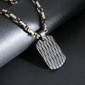 Men's titanium steel water ripple pendant necklace in black, gold, silver on Emperor Chain