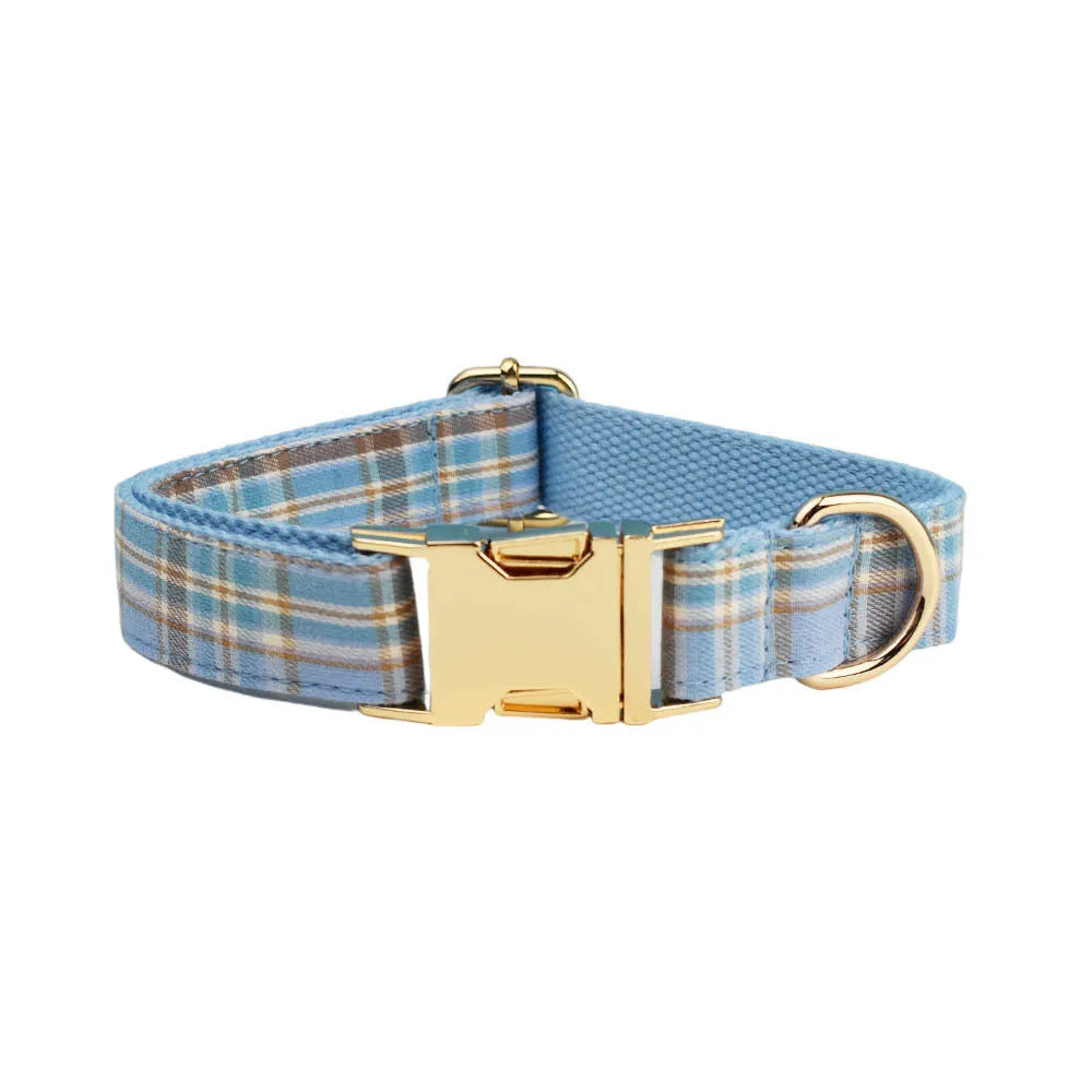 Sky blue grid forest dog collar and leash set with bow and vest on cloth material