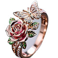 Adjustable alloy personality ring with colourful dripping oil finish showing butterfly and floral modelling