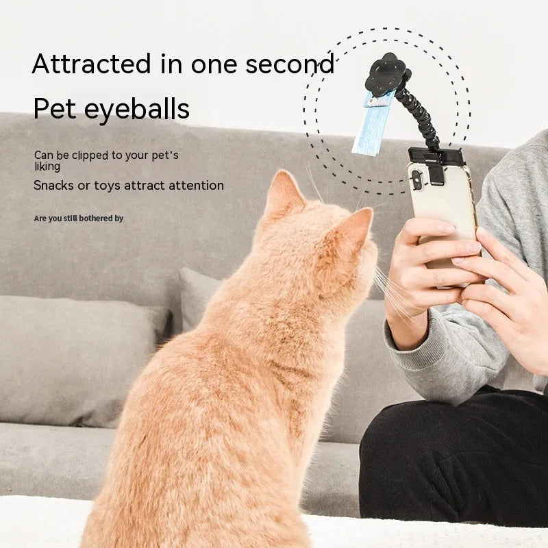 Black pet photography clip with treat holder and phone mount on white background