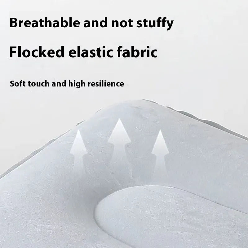 Portable press inflatable seat cushion with flocking surface folded and deflated on a table