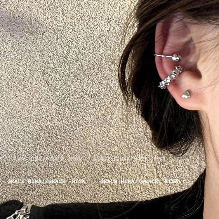Frosty silver geometric ear clip earrings with irregular shapes