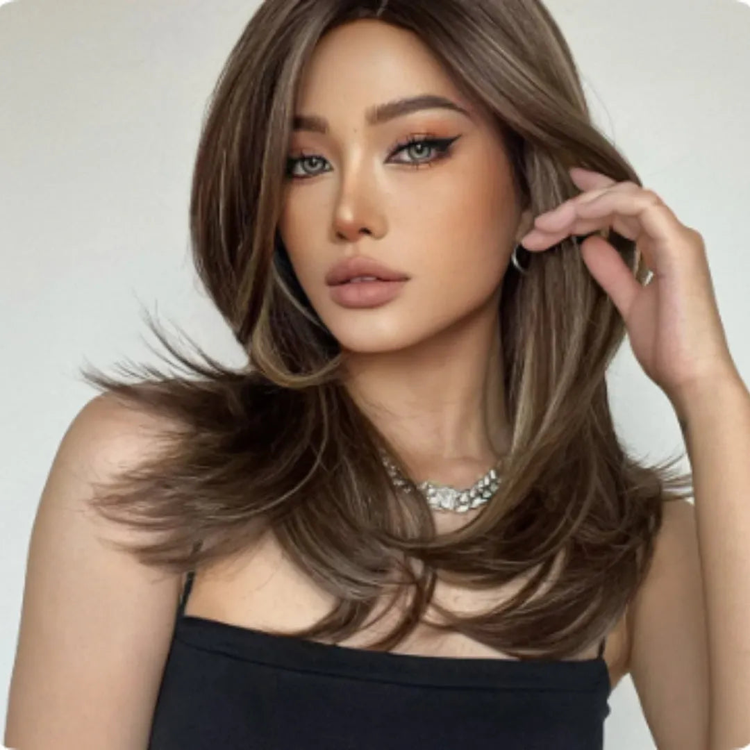 Mid-length curly full-head wig with long bangs in a white gold gradient colour