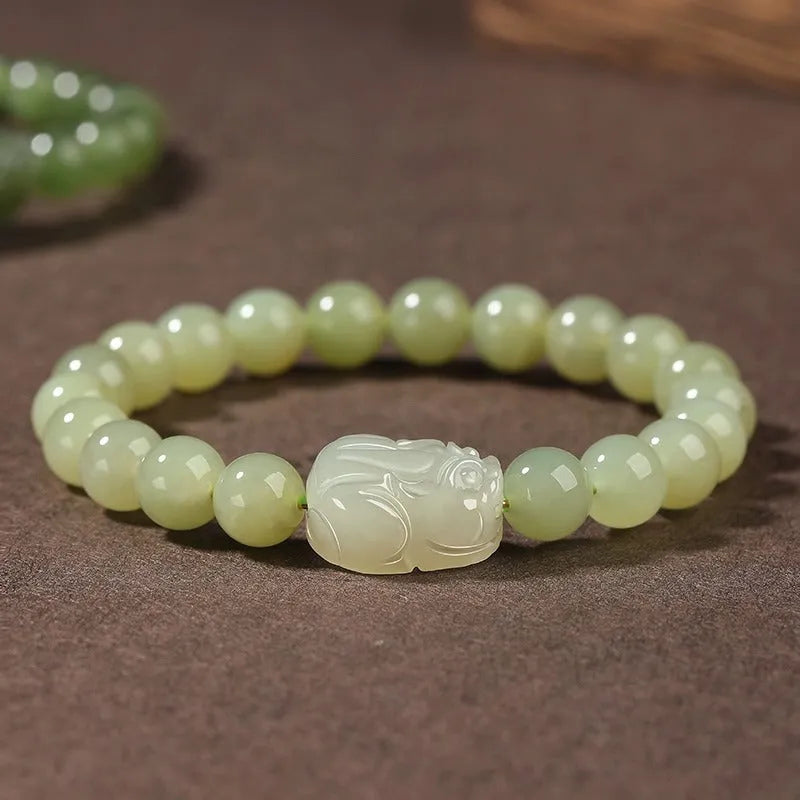Women's Hetian jade leather show bracelet in national style, polished finish, 8mm bead size on neutral background