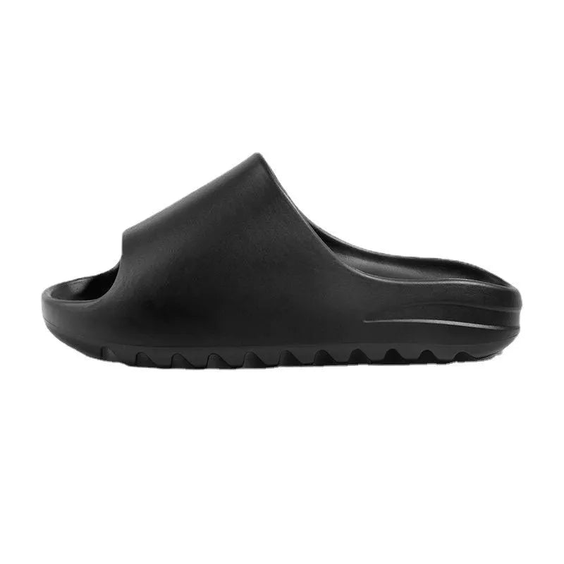 Women's thick-soled beach slippers in green, shown on a white background.
