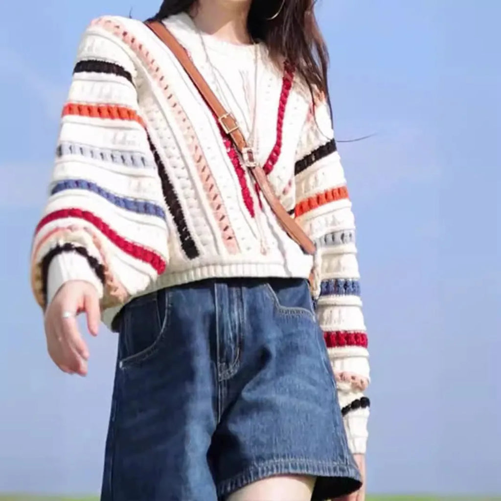 Rainbow striped batwing sleeve sweater with loose fit and round neck design