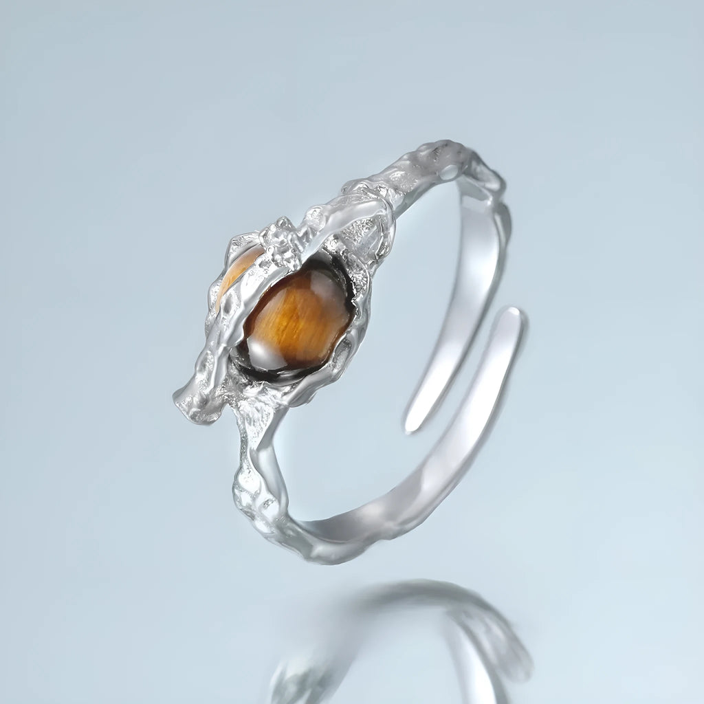 Adjustable Saturn and tigereye open ring in white gold colour electroplated silver