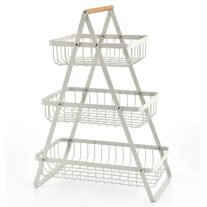 Detachable double-layer iron fruit basket with wooden handle in black on a tabletop