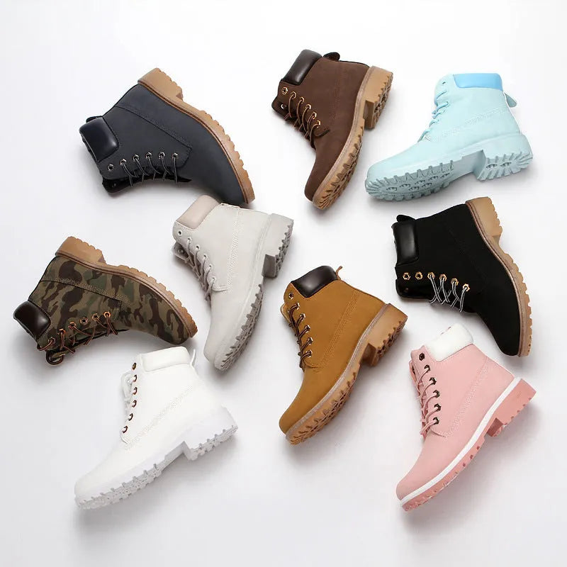 Pink men's high-top Martin boots with front laces and a velvet lining.