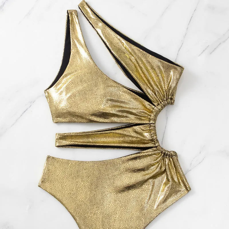 Women's gold backless one-piece swimsuit with sleeveless design