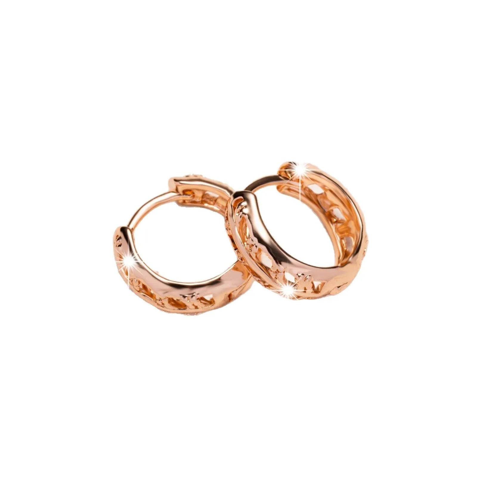 Rose gold plated copper earrings with hollowed-out leaf and heart shapes creating intricate cut-out patterns