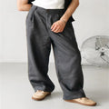 Men's loose linen high waist jogger pants in khaki, straight-leg cut, side view