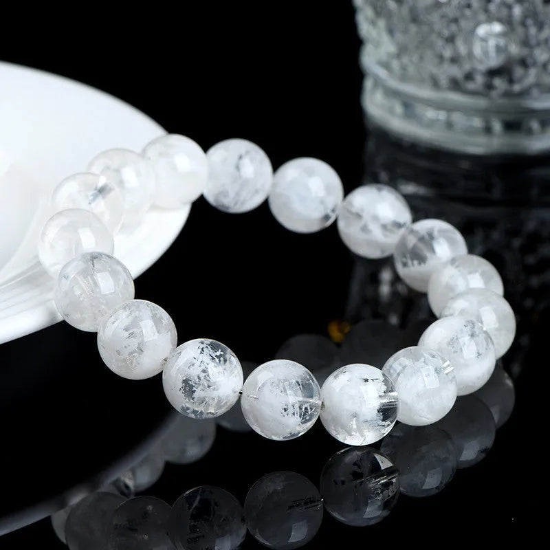 Crystal bracelet with blizzard snowflake pattern beads featuring Ruyi and Xiangyun symbols in geometric shape