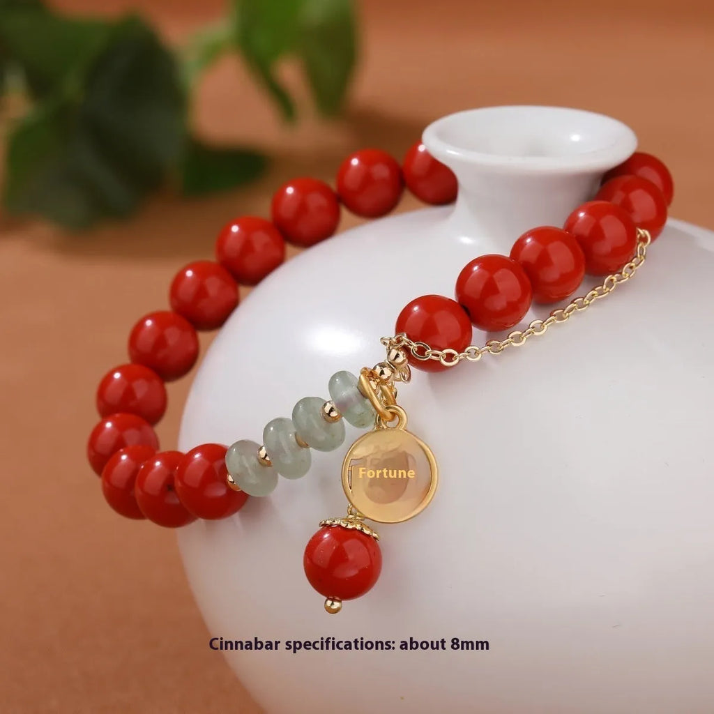 Retro women's red sand cinnabar bracelet with jade spacers and Fu character tassel, 8mm beads