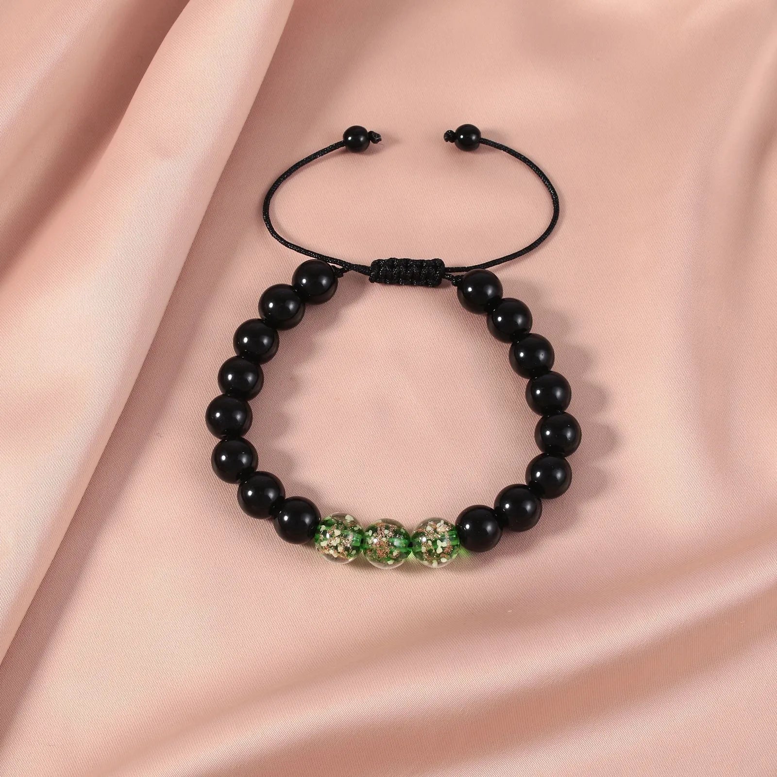 Beaded adjustable luminous bracelet with geometric glass beads in six colours