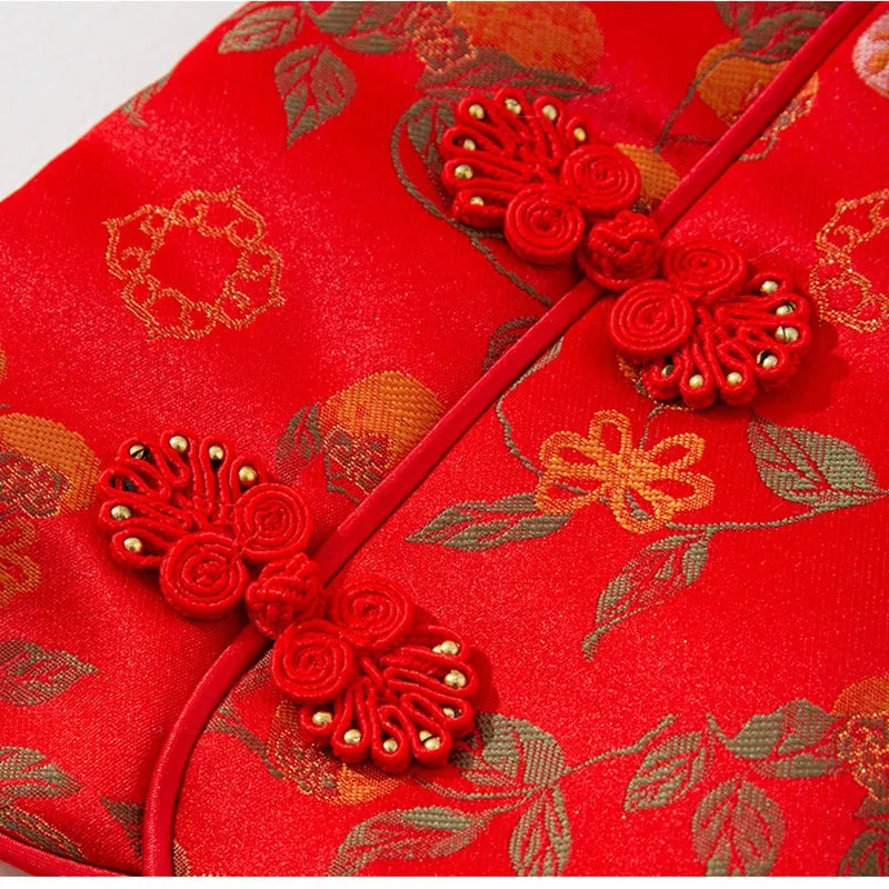 Red cheongsam pet vest with decorative knot buttons, floral and fruit patterns, for Lunar New Year